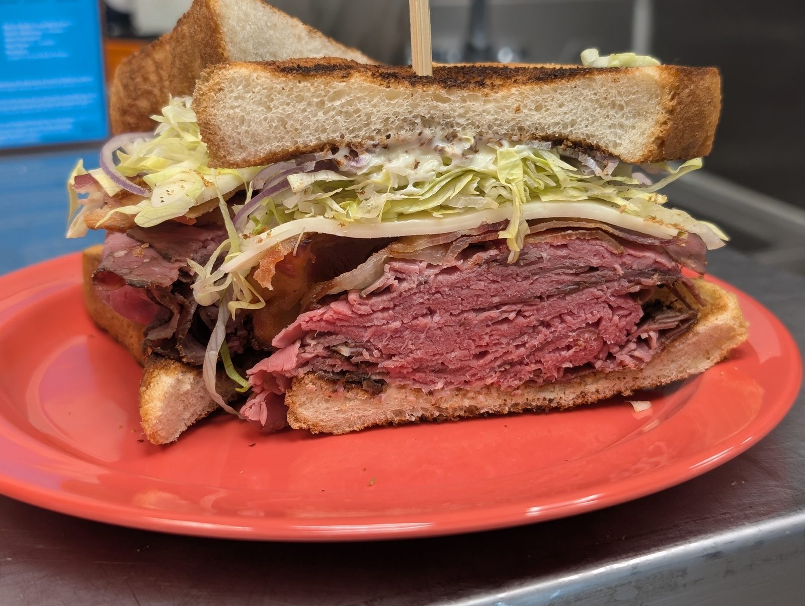 Stacked pastrami sandwich at Sak's Deli