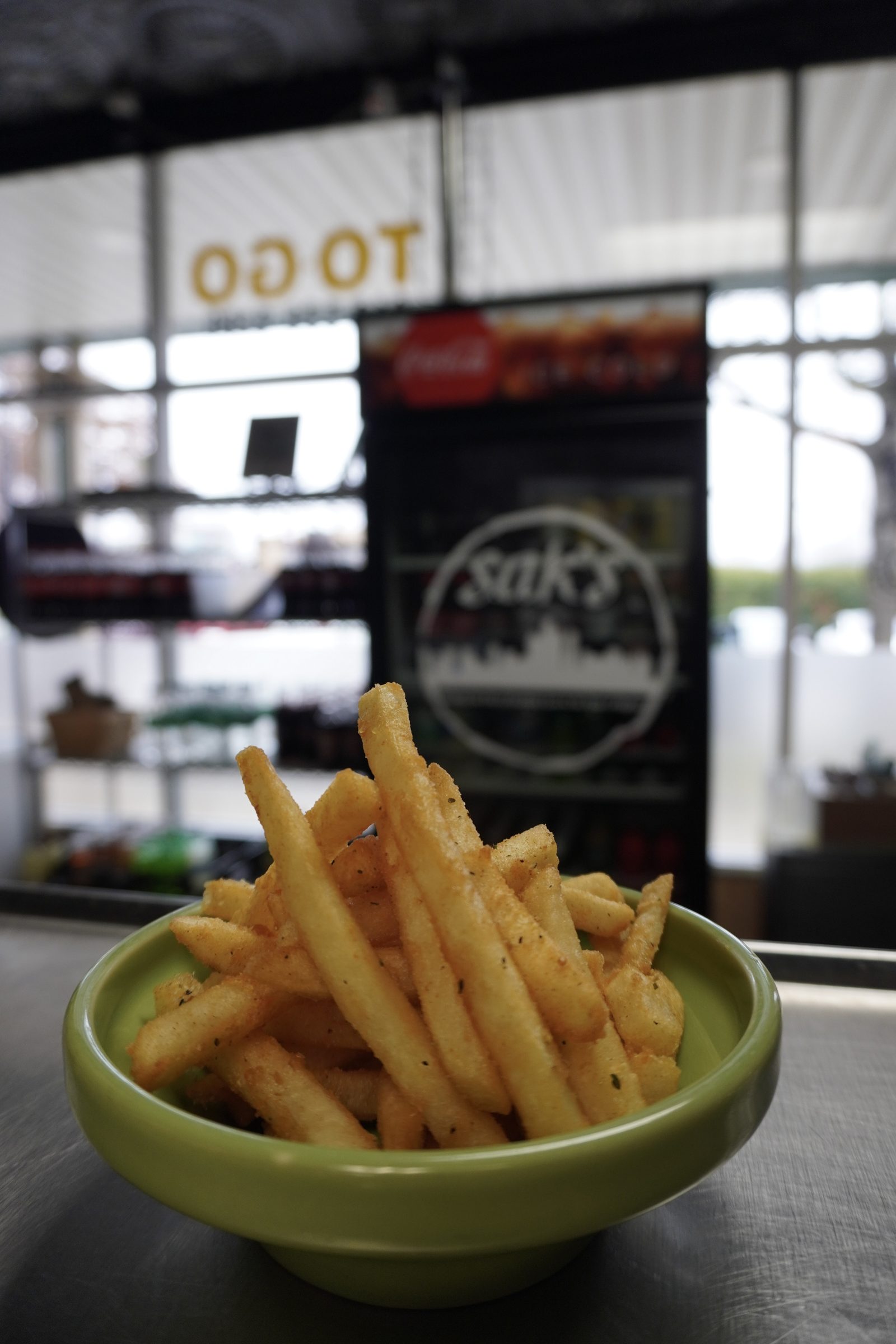 Seasoned Saks fries in a bowl